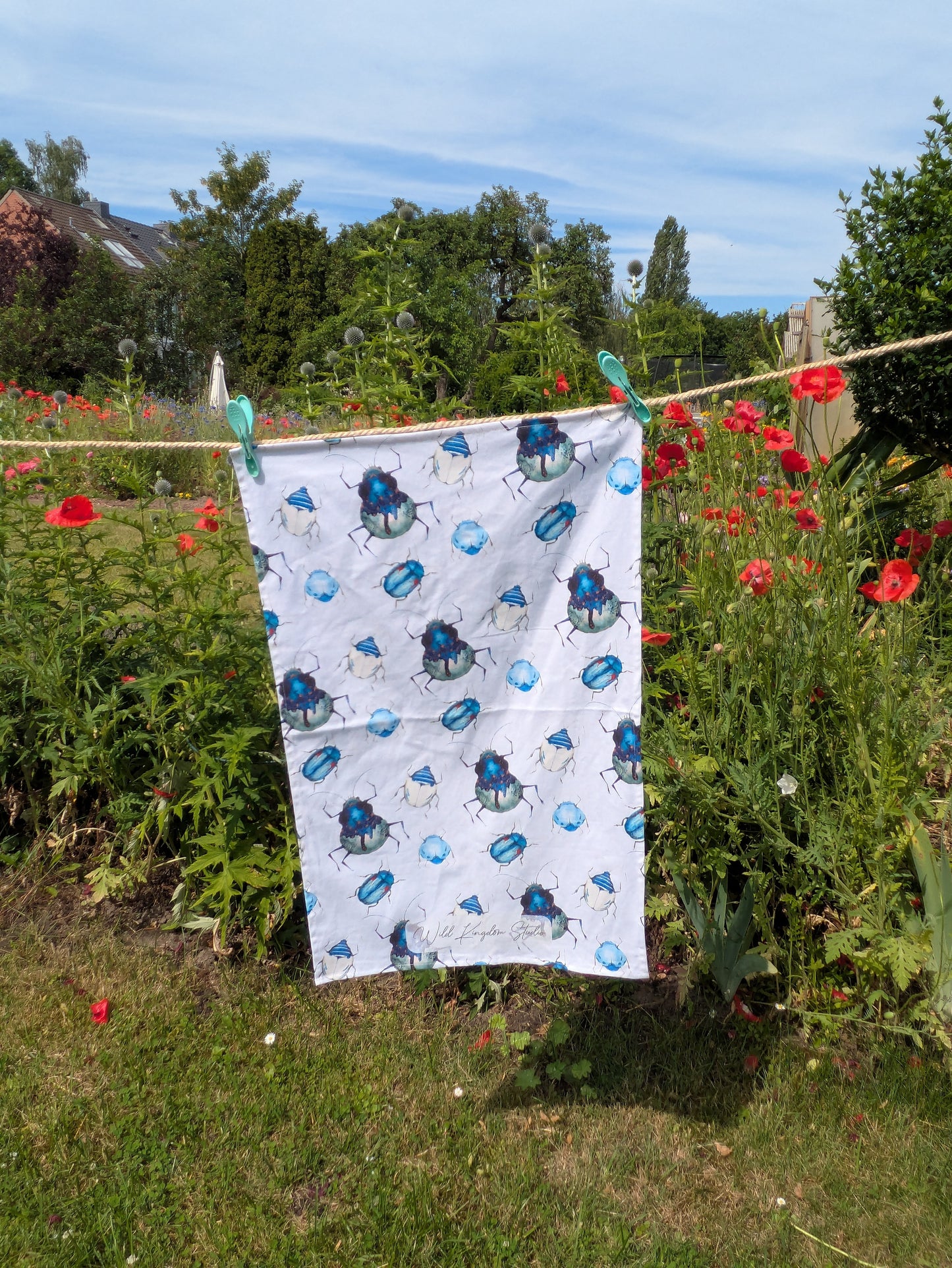 Geschirrhandtuch mit blauen Käfern