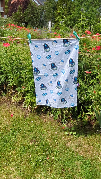 Geschirrhandtuch mit blauen Käfern